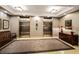 Elevator lobby with carpeted rug, decorative bench, and paneled walls at 2305 Edgewater Dr # 1509, Orlando, FL 32804