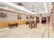 Elegant lobby with tiled floors, chandeliers, wood accents, and seating at 2305 Edgewater Dr # 1509, Orlando, FL 32804
