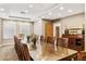 A spacious meeting room with large table, wood chairs, and elegant decor creates professional and inviting atmosphere at 2305 Edgewater Dr # 1509, Orlando, FL 32804