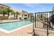 Resort-style pool with brick paver deck, lounge chairs, and tropical landscaping at 2305 Edgewater Dr # 1509, Orlando, FL 32804