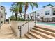 A refreshing pool surrounded by lush landscaping offers a relaxing outdoor oasis with tropical palm trees at 2305 Edgewater Dr # 1509, Orlando, FL 32804