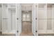 Large walk-in closet with adjustable shelving and rods for optimal storage and organization at 2305 Edgewater Dr # 1509, Orlando, FL 32804