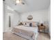 Cozy bedroom features a ceiling fan and neutral decor, creating a relaxing and inviting space at 25 Reflections Village Dr, Ormond Beach, FL 32174