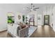 Comfortable living room featuring hardwood floors, neutral colors, stylish furniture, and great lighting at 25 Reflections Village Dr, Ormond Beach, FL 32174