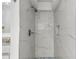 Stylish walk-in shower with marble tiling and stone floor, creating a spa-like experience at 25 Reflections Village Dr, Ormond Beach, FL 32174