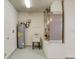 This utility room features a wash basin, water heater, and air conditioning unit at 25 Reflections Village Dr, Ormond Beach, FL 32174