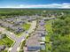 Residential community showcasing well-maintained homes, scenic ponds, and community landscaping at 2676 Estuary Loop, Oviedo, FL 32765