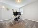 Bright home office space featuring a desk and carpet flooring at 2676 Estuary Loop, Oviedo, FL 32765