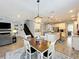 Open floor plan seamlessly connects the living, dining, and kitchen areas at 2676 Estuary Loop, Oviedo, FL 32765