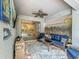 Enclosed patio with wicker furniture, a ceiling fan, and an outdoor living space at 2676 Estuary Loop, Oviedo, FL 32765