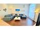 Comfortable living room with a spacious sectional sofa, bright accents, and a large window at 3129 Arrow Dr, Kissimmee, FL 34746