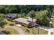Features a charming home with a large yard and a surrounding neighborhood at 360 W University Ave, Orange City, FL 32763