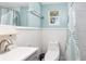 Cozy bathroom featuring a sleek white toilet and modern decor, complete with a stylish shower curtain at 360 W University Ave, Orange City, FL 32763