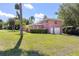 Beautiful home with a well-kept yard and a side entrance garage at 360 W University Ave, Orange City, FL 32763