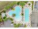 Aerial view highlighting a community pool with a unique layout, alongside a lap pool and relaxing lounge areas at 4002 Richmond Xing, Leesburg, FL 34748
