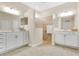 Spacious main bathroom with dual vanities, a walk-in shower, and tiled floors at 4002 Richmond Xing, Leesburg, FL 34748