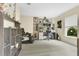 Well-lit office space with built-in shelving, massage chair, and large window at 4002 Richmond Xing, Leesburg, FL 34748