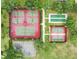 Aerial view showcasing tennis courts, a bocce ball court, and parking, surrounded by lush greenery in a vibrant community at 4002 Richmond Xing, Leesburg, FL 34748