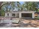 New construction home with two car garage, craftsman-style details, and a covered front porch at 5 Pecan Drive Crse, Ocala, FL 34472
