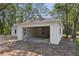 The two-car garage is spacious and offers plenty of room for storage and workshop space at 5 Pecan Drive Crse, Ocala, FL 34472