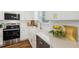 Bright kitchen featuring stainless steel appliances, white cabinetry, and white subway tile backsplash at 5 Pecan Drive Crse, Ocala, FL 34472