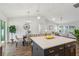 Open concept floor plan with a view from the kitchen island looking towards the dining and living areas at 5 Pecan Drive Crse, Ocala, FL 34472