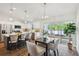 Bright eat-in kitchen features an island, stainless appliances, and backyard access at 5 Pecan Drive Crse, Ocala, FL 34472