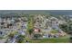 This home offers an ideal setting with mature trees, stormwater pond access, and a serene residential street at 7 Madeira Ave, Orlando, FL 32825