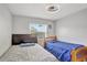 A charming bedroom features two beds with a window view at 7 Madeira Ave, Orlando, FL 32825