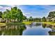 Apartment buildings overlooking tranquil pond with fountain at 830 Airport Rd # 115, Port Orange, FL 32128