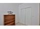 Small room with a bookshelf and closet, great for storage at 830 Airport Rd # 115, Port Orange, FL 32128