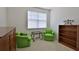 Bright sitting room with a window, carpet and casual furnishings at 830 Airport Rd # 115, Port Orange, FL 32128