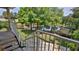 Scenic view from the top of condo stairs overlooking a serene pond at 830 Airport Rd # 115, Port Orange, FL 32128