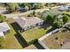 Aerial view of a backyard featuring a well-maintained lawn and partial fencing for privacy and security at 831 Lindley Blvd, Deland, FL 32724
