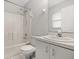 Bathroom with a shower-tub combo and vanity with a sink at 831 Lindley Blvd, Deland, FL 32724