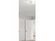 Hallway featuring multiple storage closets and access to bedrooms at 831 Lindley Blvd, Deland, FL 32724