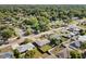 Aerial view of the neighborhood, showcasing tree-lined streets and well-maintained homes in a suburban setting at 831 Lindley Blvd, Deland, FL 32724