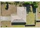 Birds eye view of the home's roof showing shape, dormers, and materials used to construct it at 831 Lindley Blvd, Deland, FL 32724