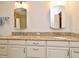 Bathroom featuring a double vanity with granite countertop and dual sinks, offering plenty of storage space at 8625 Shady Glen Dr, Orlando, FL 32819
