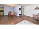 Spacious dining room with wood floors and neutral decor at 8625 Shady Glen Dr, Orlando, FL 32819