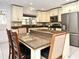 Kitchen with granite counters and center island at 8625 Shady Glen Dr, Orlando, FL 32819