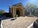 Beautiful clubhouse exterior featuring elegant columns, a decorative fountain, and manicured landscaping at 8801 Villa View Cir # 207, Orlando, FL 32821