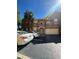 Exterior view of condo with garage, private balcony, and manicured landscaping under clear skies at 8801 Villa View Cir # 207, Orlando, FL 32821