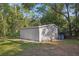Backyard storage shed with ample space for storing tools and equipment at 921 Torchwood Dr, Deland, FL 32724