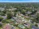 An aerial view of a neighborhood featuring lush greenery, well-maintained homes, and community streets at 986 Stonewood Ln, Maitland, FL 32751