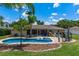 Beautiful backyard with a pool, lounge chair, and outdoor seating areas, perfect for relaxation and entertainment at 986 Stonewood Ln, Maitland, FL 32751