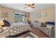 Nautical-themed bedroom with detailed decor, a cozy armchair, and a well-lit window at 986 Stonewood Ln, Maitland, FL 32751
