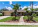 Charming single-story home with a well-manicured lawn, beautiful landscaping, and inviting curb appeal at 986 Stonewood Ln, Maitland, FL 32751