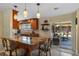 A kitchen featuring granite countertops, stainless steel appliances, tile backsplash, and slider access to outdoor space at 986 Stonewood Ln, Maitland, FL 32751