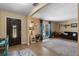 Living room featuring an elegant front door, large window, and neutral walls at 986 Stonewood Ln, Maitland, FL 32751